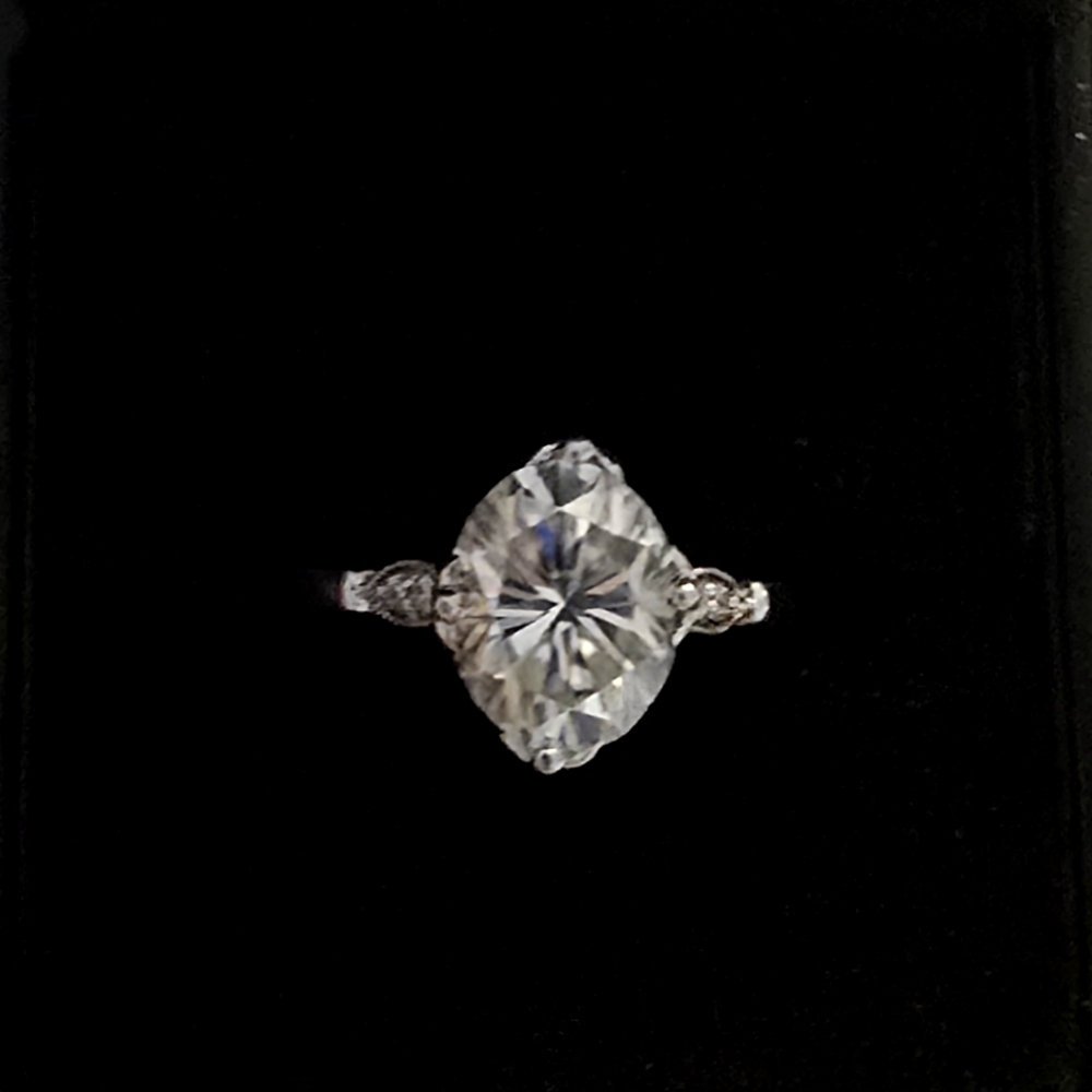 Moissanite in white gold. Feel free to make an offer!